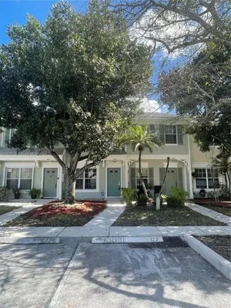Rent this 2 bed townhouse on Sanibel Drive in Tamarac, FL 33321