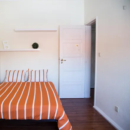 Rent this 5 bed room on Rua Alberto de Oliveira in 1700-049 Lisbon, Portugal