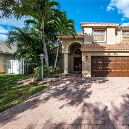 Rent this 4 bed house on 1353 Northwest 143rd Avenue in Pembroke Pines, FL 33028