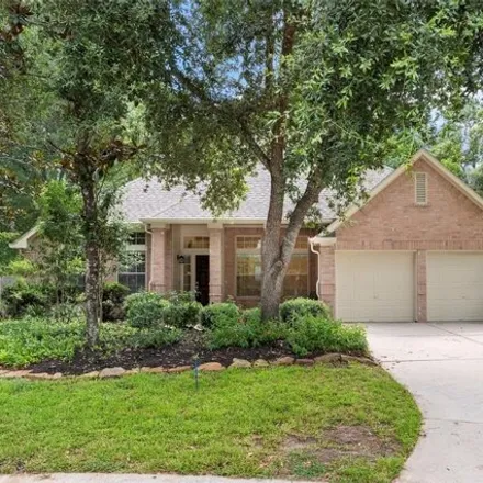 Rent this 3 bed house on 130 W Hobbit Glen Dr in Conroe, Texas