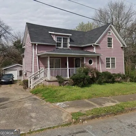 Rent this 4 bed house on 1043 Windsor Street Southwest in Atlanta, GA 30310