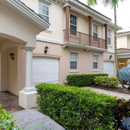 Buy this 3 bed townhouse on 422 Capistrano Drive in Monet, North Palm Beach