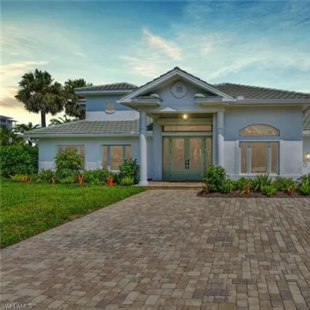 Rent this 5 bed house on 215 Mooring Line Drive in Naples, FL 34103