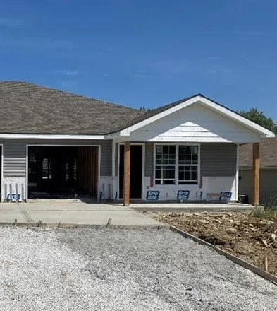 Buy this 2 bed duplex on 1717 Jo Ann Drive in Raymore, MO 64083