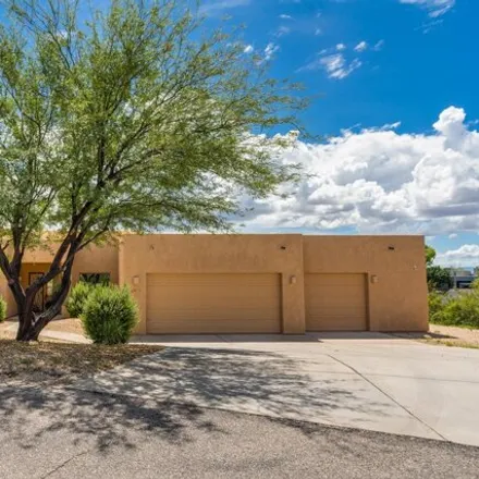 Rent this 4 bed house on East Molokai Lane in Pima County, AZ 85731