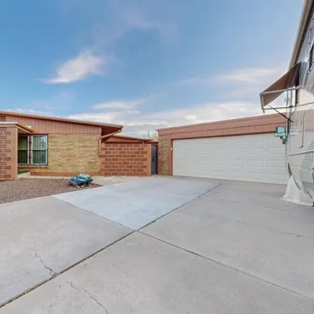 Buy this 3 bed house on 6887 Claremont Avenue Northeast in Albuquerque, NM 87110