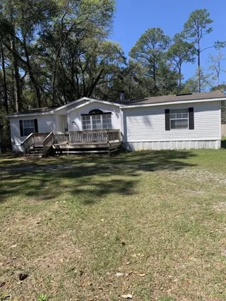 Rent this studio apartment on 7502 Allie Grimes Road in Holley, Santa Rosa County