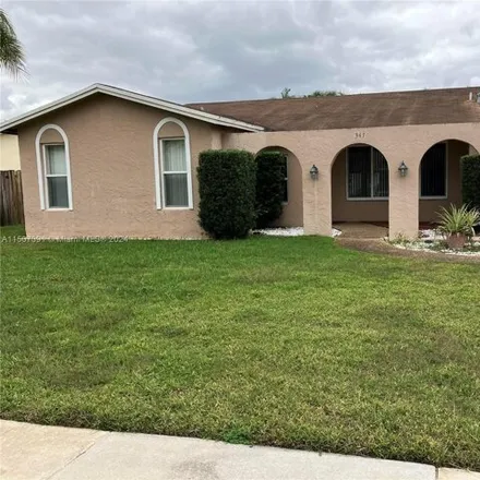 Rent this 3 bed house on 10212 Northwest 3rd Court in Plantation, FL 33324