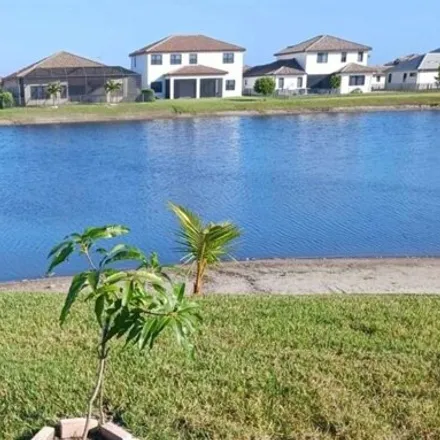 Rent this 3 bed house on Renzo Court in Ave Maria, Collier County