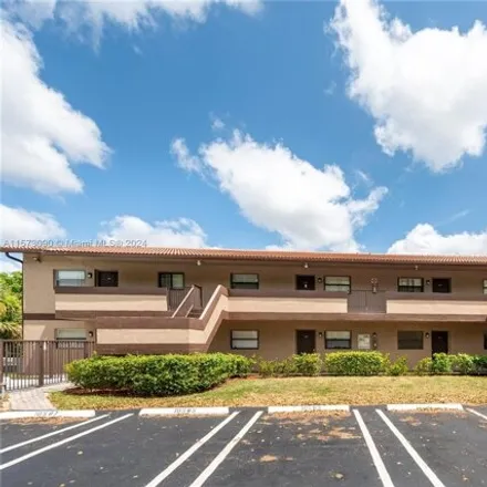 Buy this 2 bed condo on 10569 Royal Palm Boulevard in Coral Springs, FL 33065