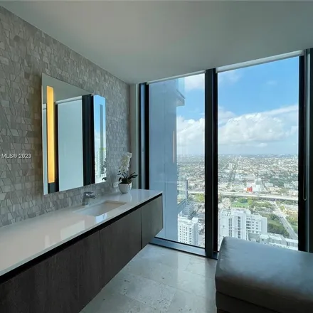 Rent this 4 bed apartment on Saks Fifth Avenue in Southwest 7th Street, Miami