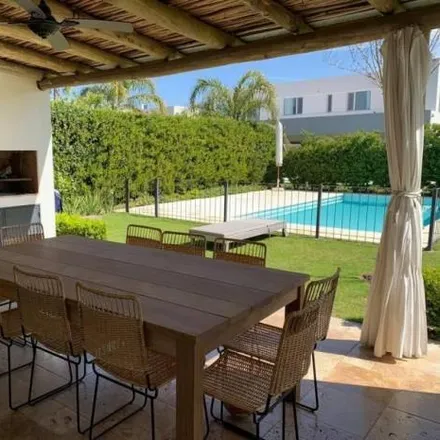 Rent this 6 bed house on unnamed road in Partido de Tigre, General Pacheco