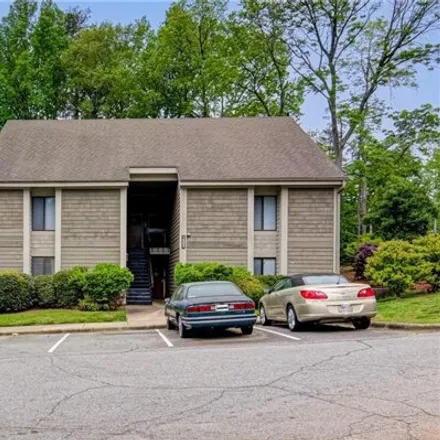 Buy this 2 bed condo on 1554 Benjamin Parkway in Guilford Hills, Greensboro