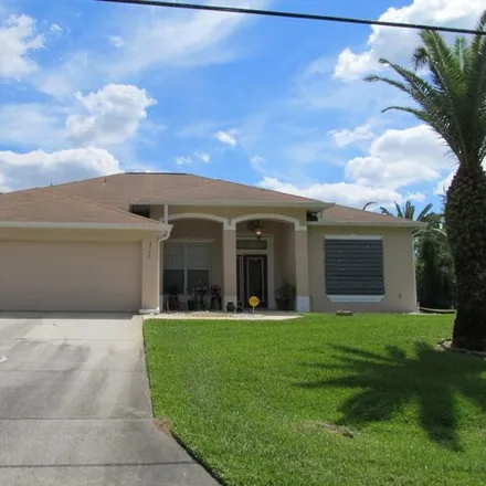 Buy this 4 bed house on Labra Road in Palm Bay, FL 32909