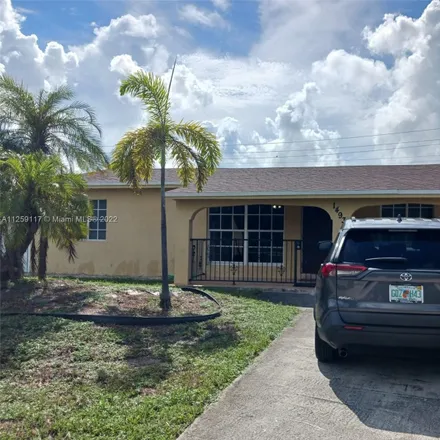 Buy this 4 bed house on 1509 Southwest 46th Avenue in Broadview Park, Broward County