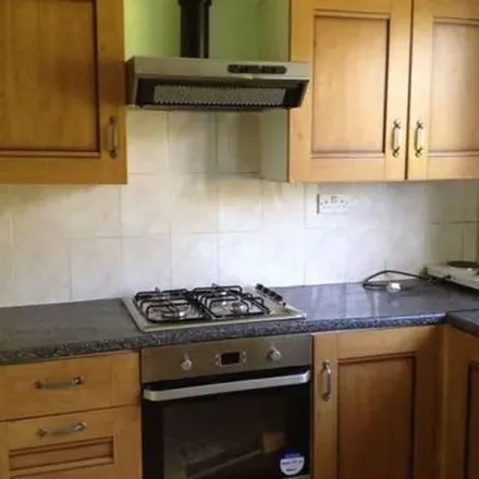 Rent this 3 bed townhouse on Manford Way in London, IG7 4AD