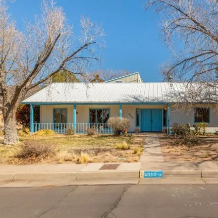 Buy this 4 bed house on 4000 Aspen Avenue Northeast in Albuquerque, NM 87110