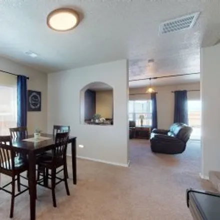 Buy this 4 bed apartment on 6565 Mountain Hawk Loop Northeast in Hawk Site, Rio Rancho