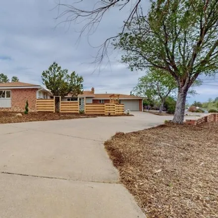 Buy this 3 bed house on 824 Warm Sands Drive Southeast in Winterwood Park (HOA), Albuquerque