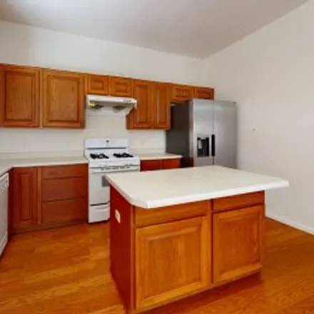Rent this 4 bed apartment on 7336 Dancing Eagle Avenue Northeast in Nor Este, Albuquerque