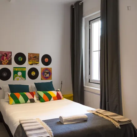 Rent this 4 bed room on Rua António Pedro 141 in 1000-040 Lisbon, Portugal