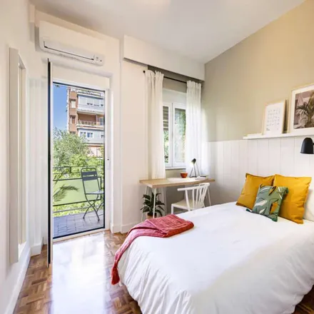 Rent this 6 bed room on Ministerio de Defensa in Calle Pedro Teixeira, 28020 Madrid
