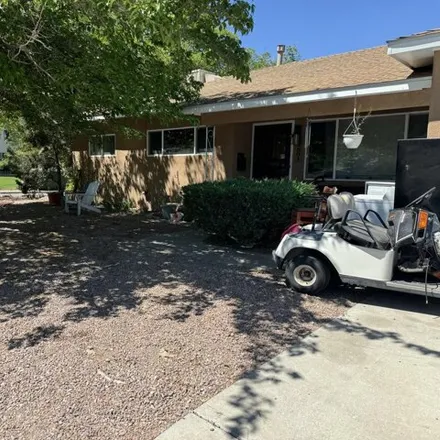 Buy this 3 bed house on 10881 Indian School Road Northeast in Oñate, Albuquerque