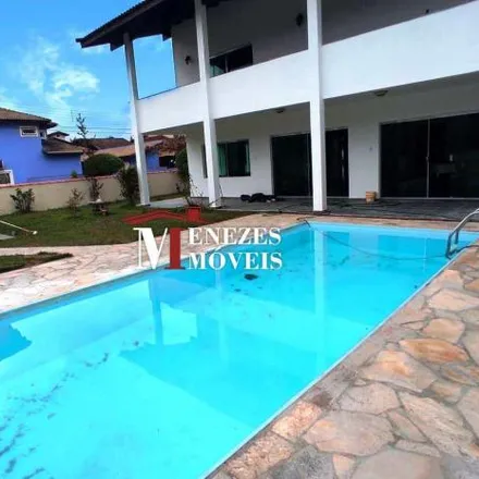 Rent this 4 bed house on Rua Rodrigues Alves in Centro, Bertioga - SP