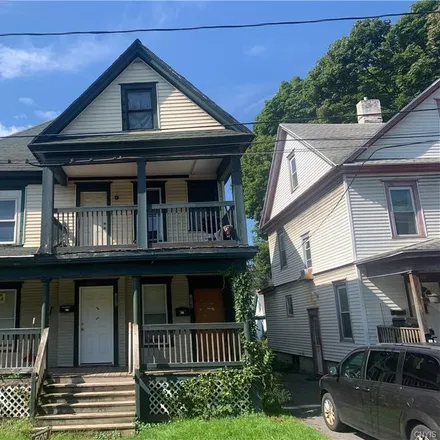 Buy this 6 bed townhouse on 122 East Florence Avenue in City of Syracuse, NY 13205