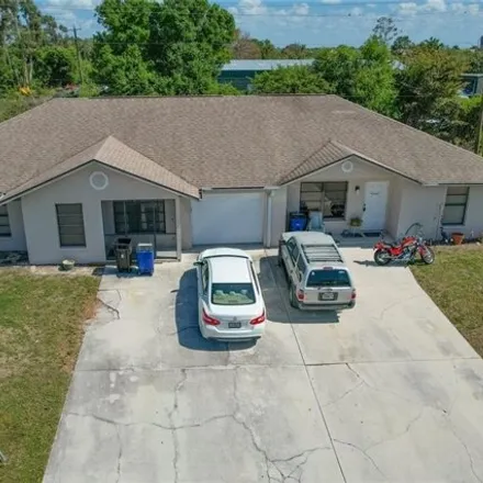 Buy this 5 bed house on 18903 Holly Road in San Carlos Park, FL 33967