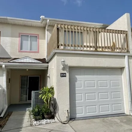 Rent this 3 bed house on 214 Cherie Down Lane in Cape Canaveral, FL 32920