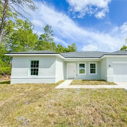 Buy this 4 bed house on Southwest 131st Road in Marion County, FL 34473