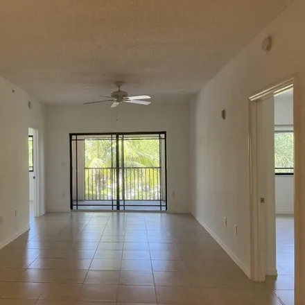 Rent this 2 bed condo on 2812 Grande Pkwy Apt 301 in Palm Beach Gardens, Florida