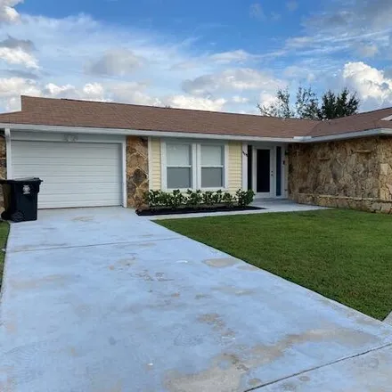 Buy this 4 bed house on 1181 Southwest Hibiscus Street in Port Saint Lucie, FL 34983