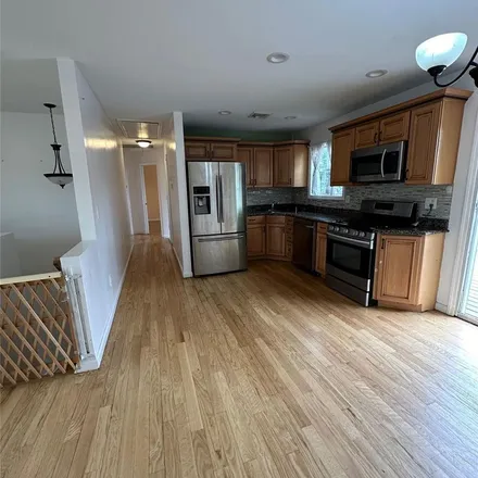 Rent this 3 bed apartment on 98 Cortelyou Street in Islip, NY 11751
