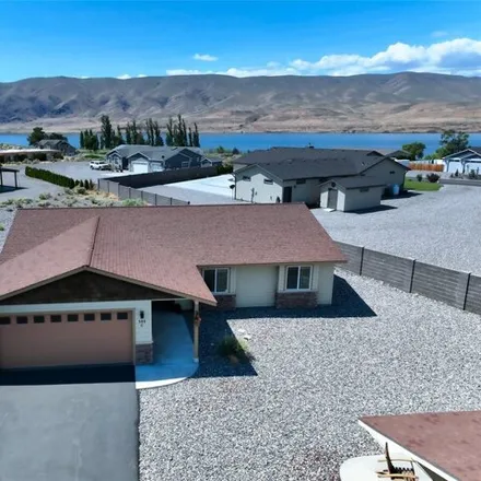 Buy this 3 bed house on 505 Clubhouse Way Southwest in Desert Aire, Grant County