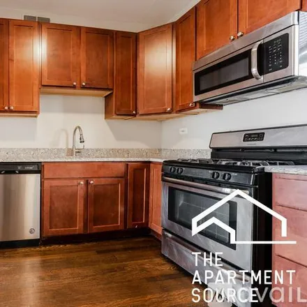 Image 1 - 920 W Belle Plaine Ave, Unit 3E - Apartment for rent