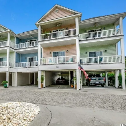 Buy this 4 bed townhouse on 1512 Holly Drive in Crescent Beach, North Myrtle Beach