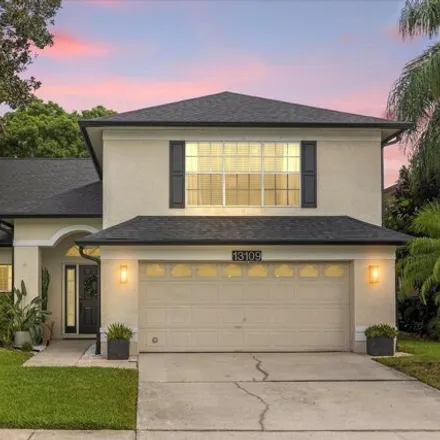 Buy this 4 bed house on 13109 Arcadian Shore Ct in Orlando, Florida