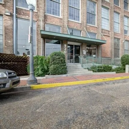 Rent this 2 bed condo on 920 Poeyfarre Street in New Orleans, LA 70130