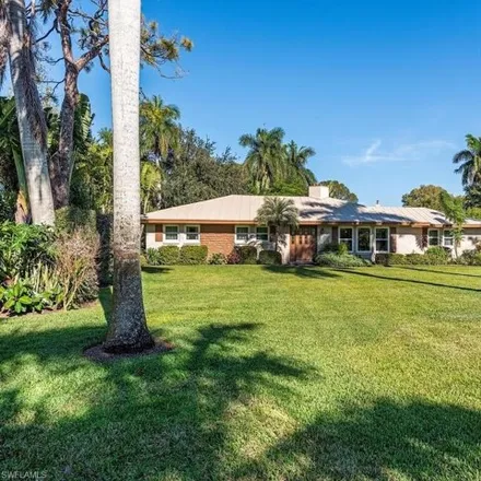 Buy this 4 bed house on 733 Pectin Road in Naples, FL 34102