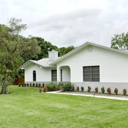 Rent this 4 bed house on 61st Lane North in Palm Beach County, FL 33412