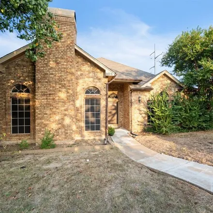 Rent this 3 bed house on 2075 Camelot Drive in Lewisville, TX 75067