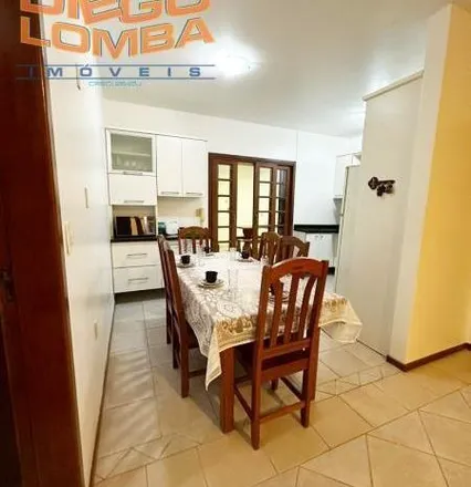 Rent this 3 bed house on Travessa Porto dos Navegantes in Ponta das Canas, Florianópolis - SC