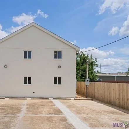 Rent this 4 bed house on 1318 South Salcedo Street in New Orleans, LA 70125