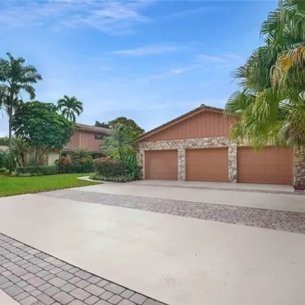 Buy this 5 bed house on 11100 Northwest 24th Street in Coral Springs, FL 33065