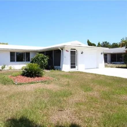 Rent this 3 bed house on 5819 10th Avenue in Elfers, FL 34652
