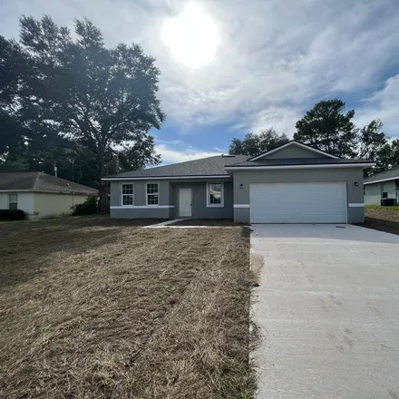 Buy this 4 bed house on 12810 Southwest 40th Terrace in Marion County, FL 34473