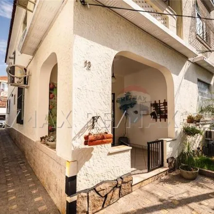 Buy this 3 bed house on Rede Multi Market in Rua Doutor Paulo César, Pé Pequeno