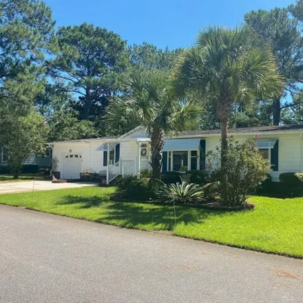 Buy this studio apartment on 3257 Santee Drive in Garden City Beach, Horry County